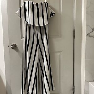 Mika & Gala black and white jump suit. Size 12 but fits like a 10.